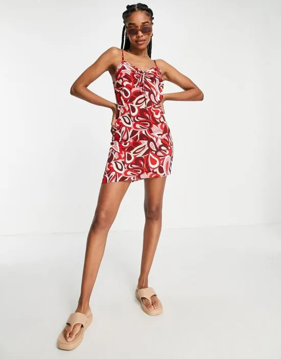 https://images.styletyx.com/images/mini-shift-dress-in-swirl-print-urban-threads-tall-1939544_4.webp