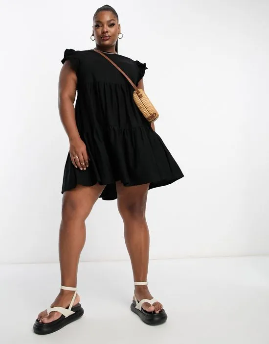 https://images.styletyx.com/images/mini-smock-dress-in-black-river-island-423346383_1.webp