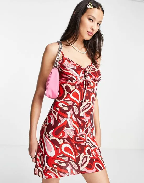 https://images.styletyx.com/images/mini-swing-dress-in-swirl-print-urban-threads-2771997_1.webp