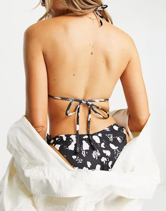 https://images.styletyx.com/images/mix-and-match-tie-front-triangle-bikini-top-in-mono-spot-print-asos-design-1765461_2.webp