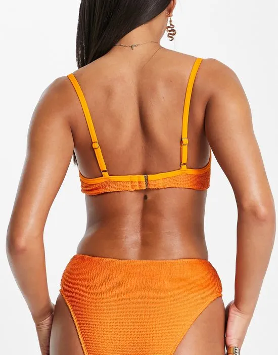 https://images.styletyx.com/images/mix-and-match-underwire-bikini-top-in-orange-scrunch-free-society-2548805_2.webp