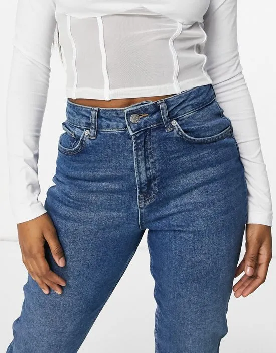 https://images.styletyx.com/images/mom-jeans-in-mid-blue-na-kd-3120807_3.webp