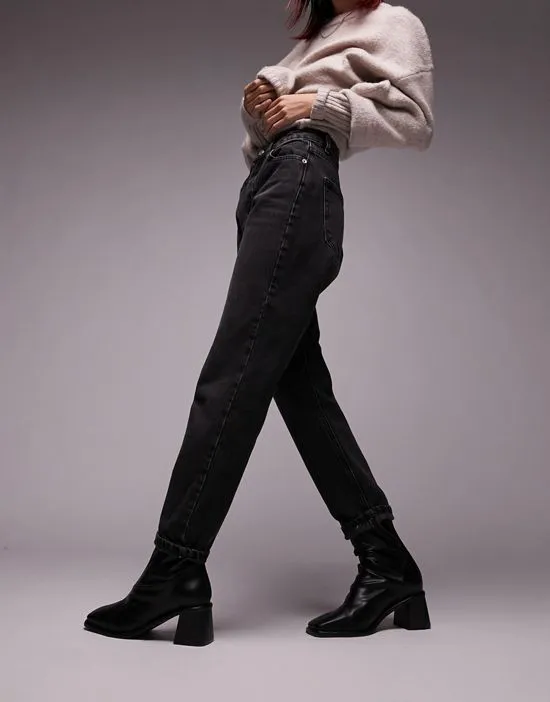 https://images.styletyx.com/images/mom-jeans-in-washed-black-topshop-3129144_4.webp