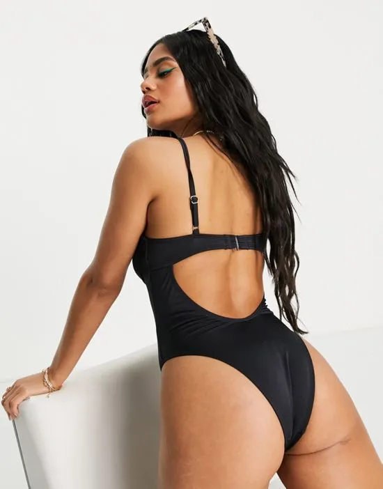 https://images.styletyx.com/images/monowire-swimsuit-with-deep-plunge-cut-out-detail-in-black-free-society-1760697_2.webp