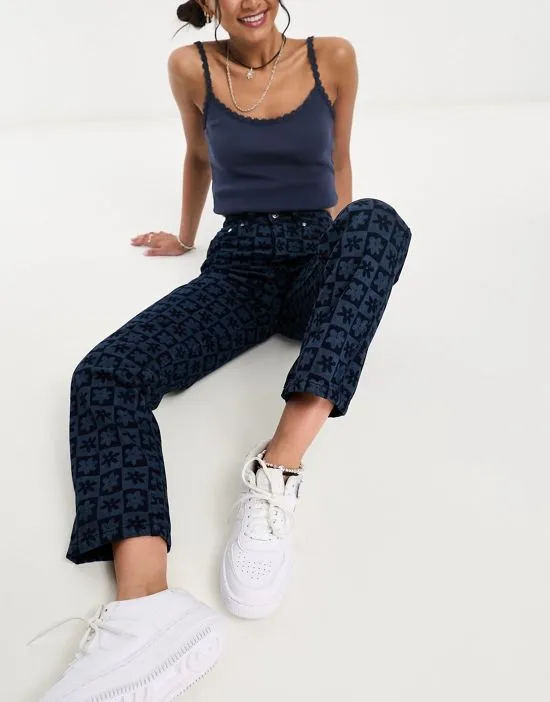 https://images.styletyx.com/images/montana-floral-printed-high-waist-straight-leg-jeans-in-blue-bolongaro-trevor-873177384_5.webp