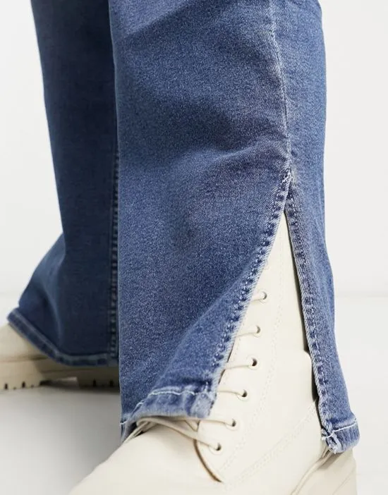 https://images.styletyx.com/images/moxy-straight-leg-shoe-split-jeans-in-mid-blue-dr-denim-plus-12998903_2.webp