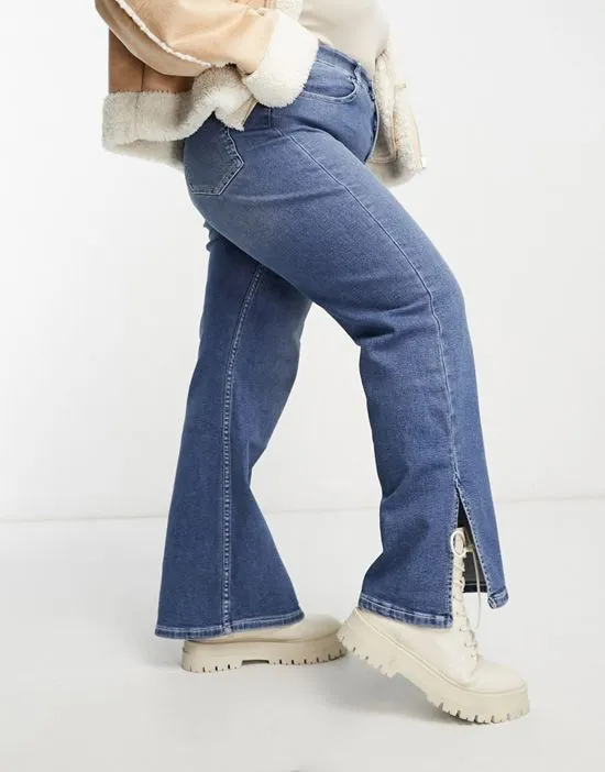 https://images.styletyx.com/images/moxy-straight-leg-shoe-split-jeans-in-mid-blue-dr-denim-plus-12998903_5.webp