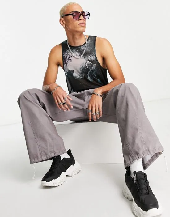 https://images.styletyx.com/images/muscle-fit-tank-top-in-all-over-blur-print-mesh-multi-asos-design-2515949_3.webp