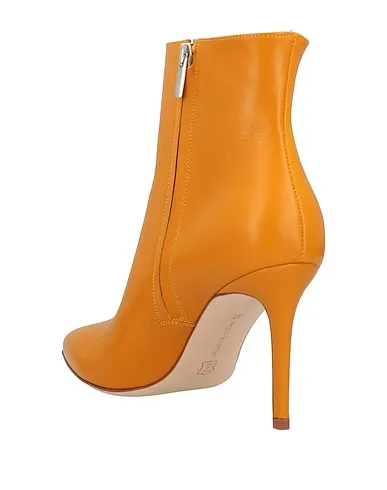 https://images.styletyx.com/images/mustard-leather-ankle-boot-sergio-levantesi-13230326_3.webp