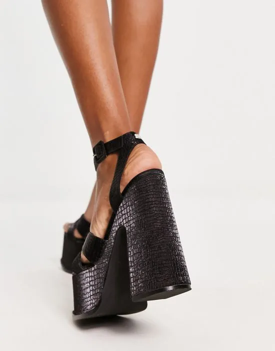https://images.styletyx.com/images/natasha-platform-sandals-in-black-shellys-london-2604714_3.webp