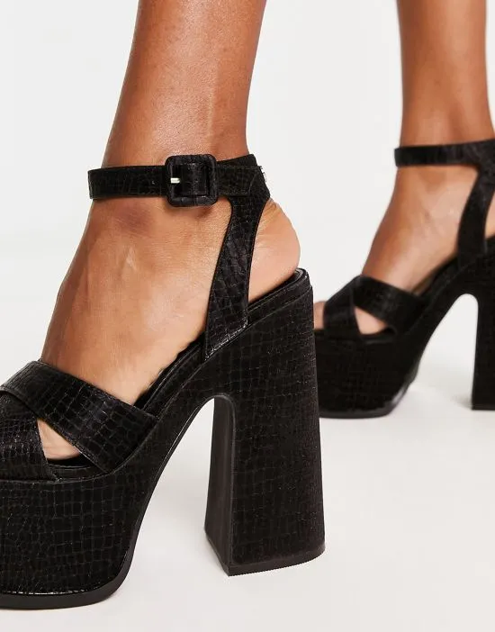 https://images.styletyx.com/images/natasha-platform-sandals-in-black-shellys-london-2604714_4.webp