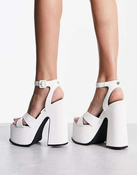 https://images.styletyx.com/images/natasha-platform-sandals-in-white-shellys-london-13001429_2.webp