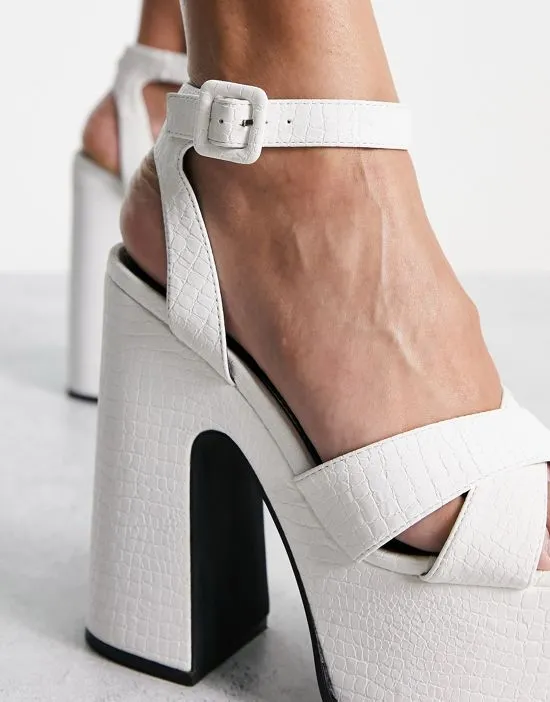 https://images.styletyx.com/images/natasha-platform-sandals-in-white-shellys-london-13001429_3.webp