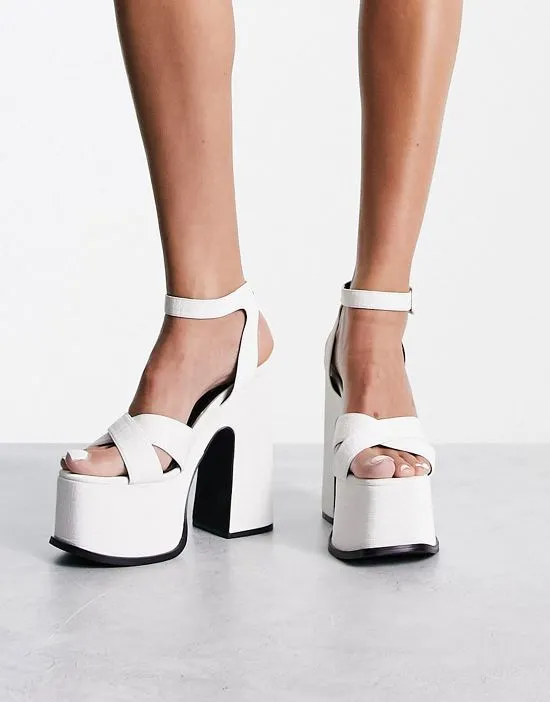 https://images.styletyx.com/images/natasha-platform-sandals-in-white-shellys-london-13001429_4.webp