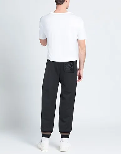 https://images.styletyx.com/images/navy-blue-knitted-casual-pants-loewe-1800985017_3.webp
