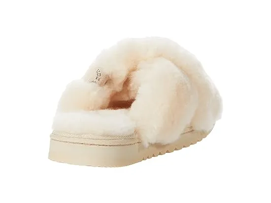 https://images.styletyx.com/images/new-castle-genuine-shearling-cross-band-slide-fireside-by-dearfoams-2374418_5.webp