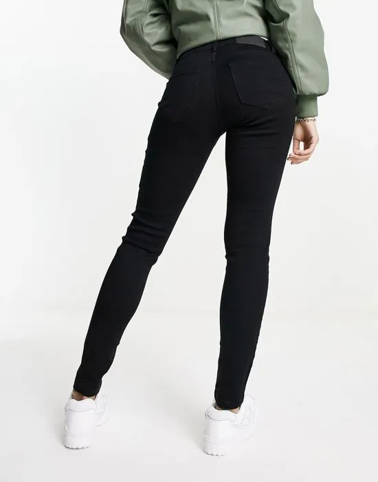 https://images.styletyx.com/images/noisy-allie-may-low-rise-skinny-jeans-in-washed-black-noisy-may-13102142_2.webp