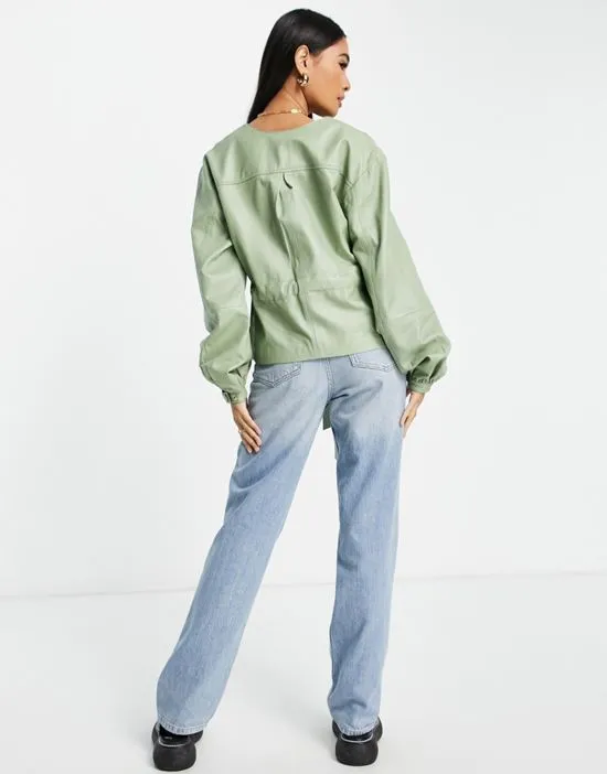 https://images.styletyx.com/images/nun-volume-sleeve-leather-top-in-sage-green-part-of-a-set-muubaa-2643007_2.webp