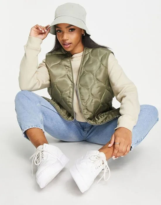 https://images.styletyx.com/images/nylon-onion-quilted-vest-in-light-khaki-asos-design-2341802_4.webp
