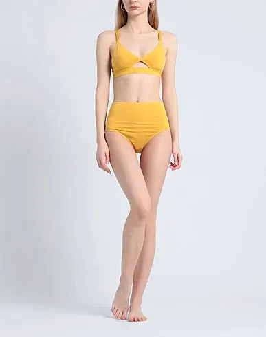 https://images.styletyx.com/images/ocher-jersey-bra-cut-out-wide-strap-the-nude-label-13180467_2.webp