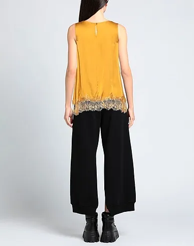 https://images.styletyx.com/images/ocher-lace-top-angela-davis-1855341915_3.webp