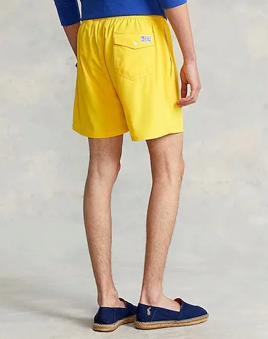 https://images.styletyx.com/images/ocher-swim-shorts-5-5-inch-traveler-swim-trunk-ralph-lauren-1939991230_3.webp