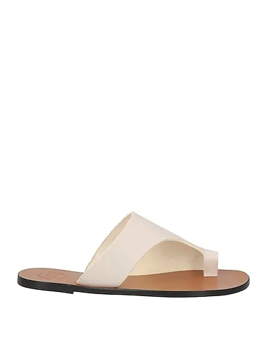 https://images.styletyx.com/images/off-white-leather-flip-flops-atp-atelier-1004914131_1.webp