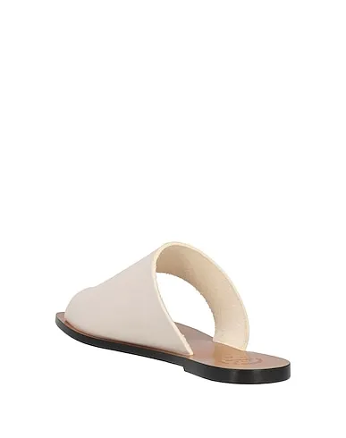 https://images.styletyx.com/images/off-white-leather-flip-flops-atp-atelier-1004914131_3.webp