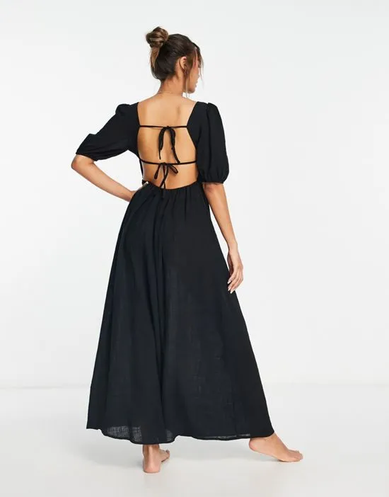 https://images.styletyx.com/images/open-back-beach-dress-in-black-urban-threads-13313880_4.webp