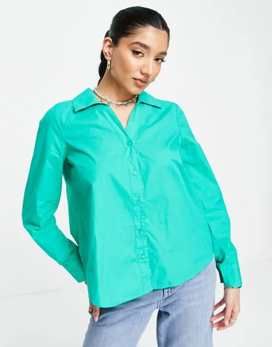 https://images.styletyx.com/images/open-back-shirt-in-bright-green-pieces-1883668_1.webp