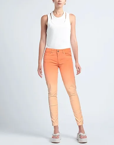 https://images.styletyx.com/images/orange-denim-denim-pants-heritage-13442641_2.webp