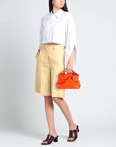 https://images.styletyx.com/images/orange-leather-handbag-tubici-1005482937_3.webp