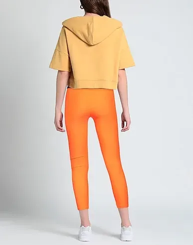 https://images.styletyx.com/images/orange-synthetic-fabric-leggings-diego-rodriguez-13258403_3.webp