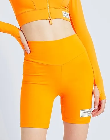 https://images.styletyx.com/images/orange-synthetic-fabric-leggings-the-giving-movement-x-yoox-1504824_5.webp