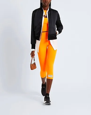 https://images.styletyx.com/images/orange-synthetic-fabric-top-the-giving-movement-x-yoox-1504700_4.webp