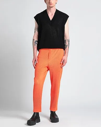 https://images.styletyx.com/images/orange-techno-fabric-casual-pants-homme-plisse-by-issey-miyake-1004124641_2.webp