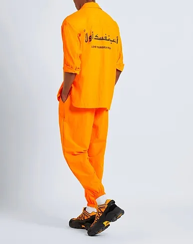 https://images.styletyx.com/images/orange-techno-fabric-casual-pants-the-giving-movement-x-yoox-2063997_5.webp