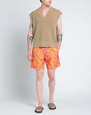 https://images.styletyx.com/images/orange-techno-fabric-swim-shorts-versace-1045929438_2.webp