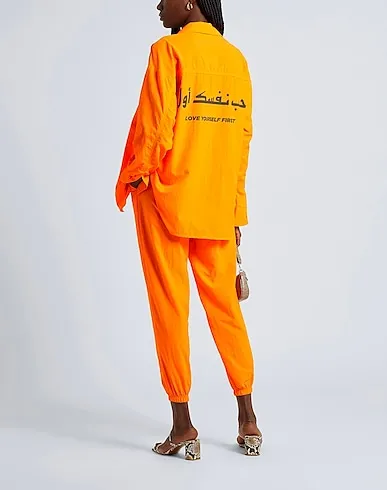 https://images.styletyx.com/images/orange-techno-fabric-the-giving-movement-x-yoox-13531482_5.webp