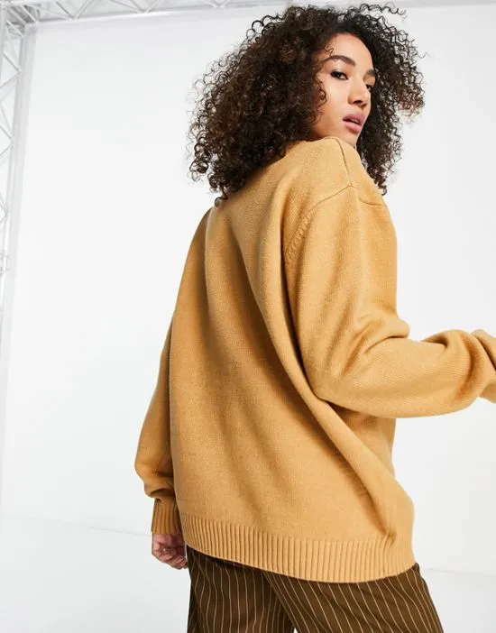 https://images.styletyx.com/images/oversized-knitted-sweater-with-front-logo-karl-kani-1767232_2.webp