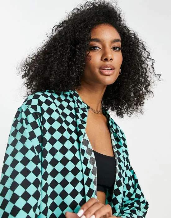 https://images.styletyx.com/images/oversized-shirt-in-teal-diamond-plaid-part-of-a-set-urban-threads-2429267_3.webp