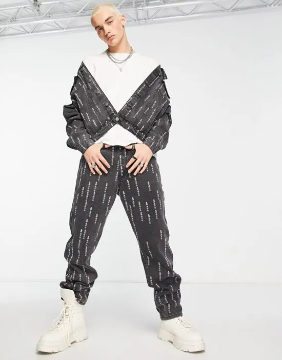https://images.styletyx.com/images/oversized-straight-leg-denim-jeans-in-black-with-all-over-japanese-text-print-part-of-a-set-liquor-n-poker-3098499_1.webp