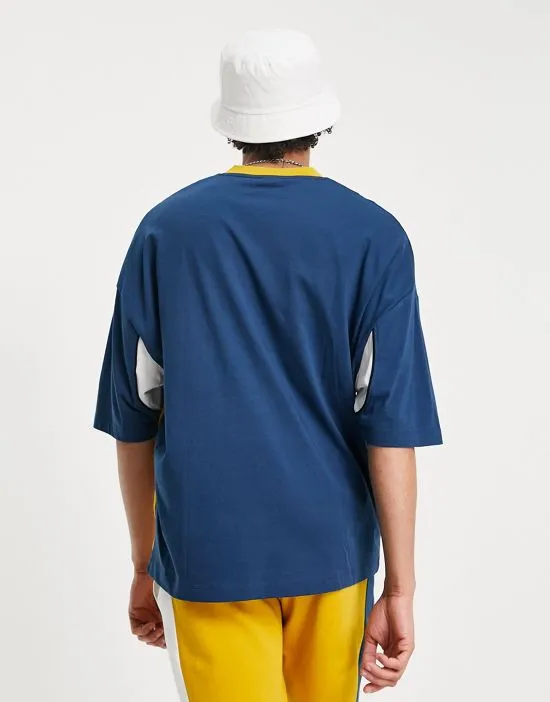 https://images.styletyx.com/images/oversized-t-shirt-in-yellow-and-navy-color-block-with-v-neck-and-utah-city-print-part-of-a-set-asos-design-1853431_2.webp