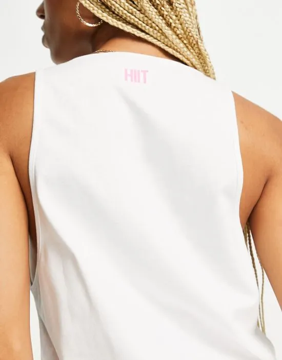 https://images.styletyx.com/images/oversized-tank-top-with-drop-armhole-in-white-hiit-2870157_4.webp