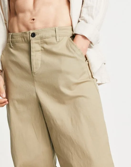 https://images.styletyx.com/images/oversized-tapered-chinos-in-light-khaki-asos-design-2714871_4.webp