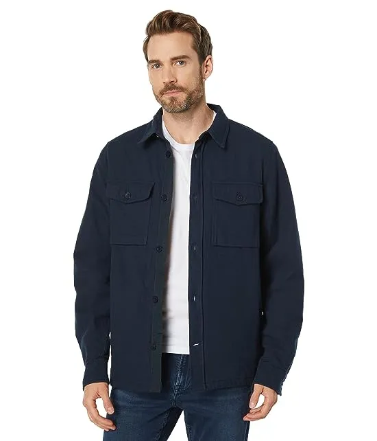 https://images.styletyx.com/images/ovik-lite-padded-shirt-fjallraven-2914333_1.webp