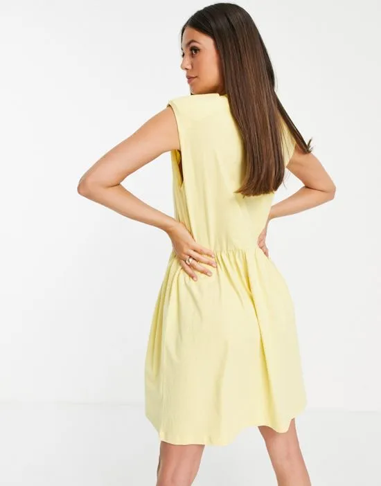 https://images.styletyx.com/images/padded-shoulder-mini-smock-dress-in-yellow-noisy-may-tall-1836427_2.webp