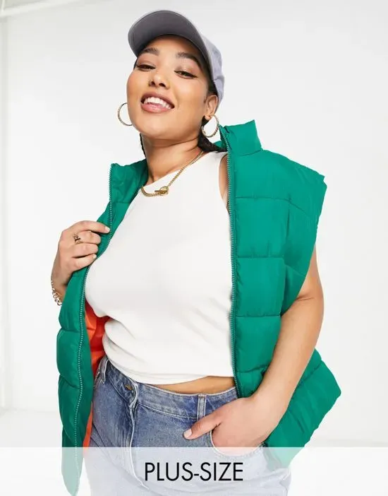 https://images.styletyx.com/images/padded-vest-in-bright-green-noisy-may-curve-2478897_1.webp