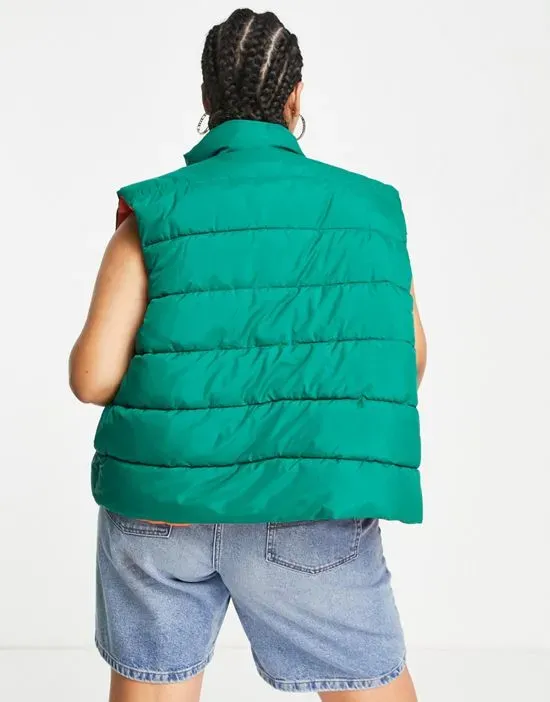 https://images.styletyx.com/images/padded-vest-in-bright-green-noisy-may-curve-2478897_2.webp