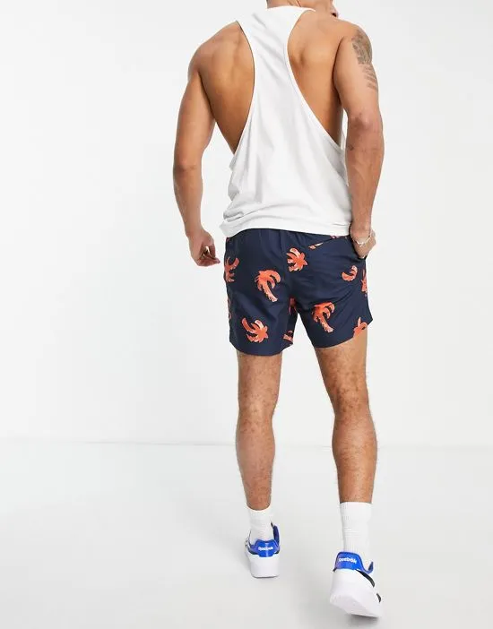 https://images.styletyx.com/images/palm-print-swim-trunks-in-navy-farah-13139918_3.webp